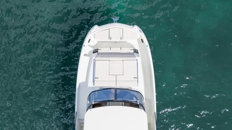 Slide: The Image of Top view of a 2025 YOT 36 yacht on clear blue water. - 11