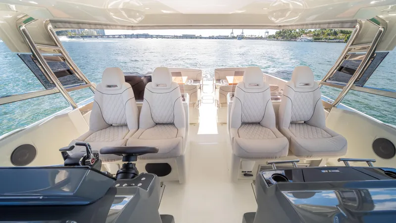 Slide: The Image of Luxurious 2025 YOT 36 yacht interior with plush seating and panoramic ocean view. - 28