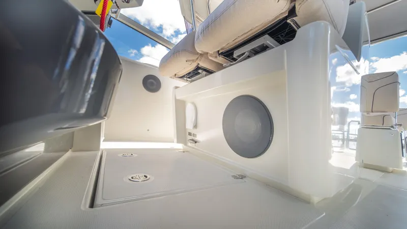 Slide: The Image of 2025 YOT 36 boat interior with modern seating and speaker system. - 30