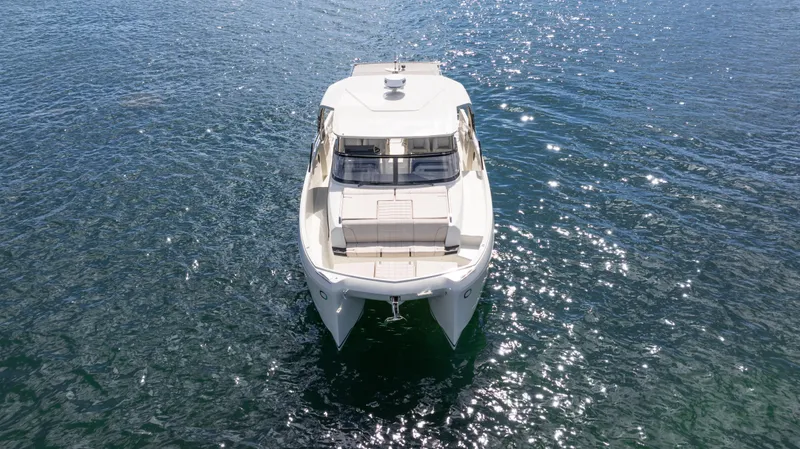 Slide: The Image of Aerial view of 2025 YOT 36 boat on sparkling blue water. - 5