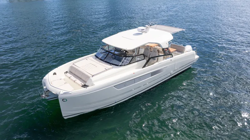 Slide: The Image of Luxurious 2025 YOT 36 yacht cruising on serene blue waters. - 6