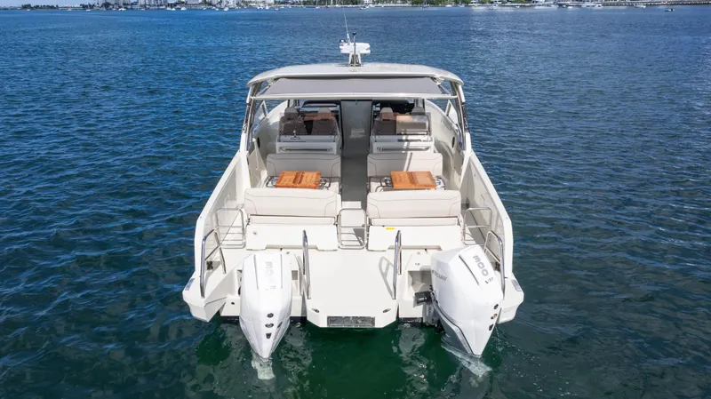 Slide: The Image of Luxury YOT 36 boat, 2025 model, cruising on open water. - 8