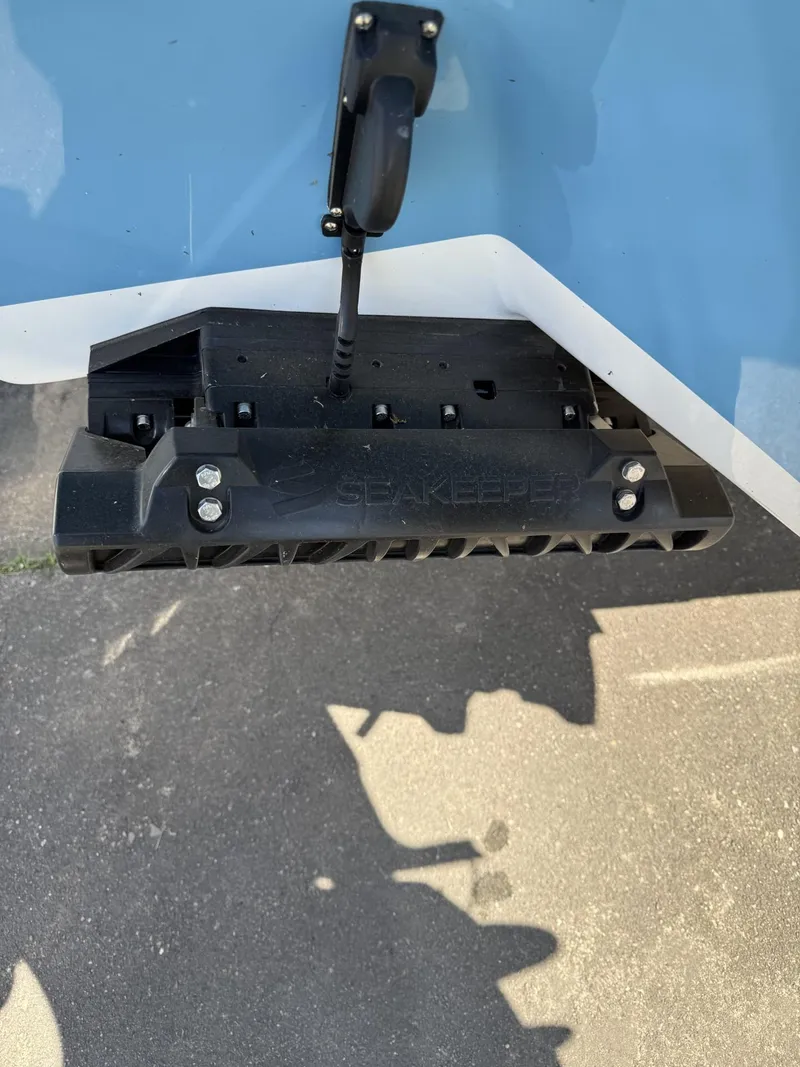 Slide: The Image of 2025 Tidewater 232 CC Adventure boat with mounted transducer. - 3