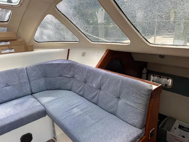 Slide: The Image of Interior of a 1995 Lagoon TPI 37 yacht with blue upholstery. - 47
