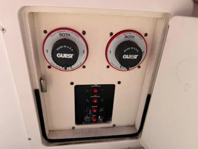 Slide: The Image of Control panel of a 2003 Grady-White Sailfish 282 boat with dual battery switches. - 15