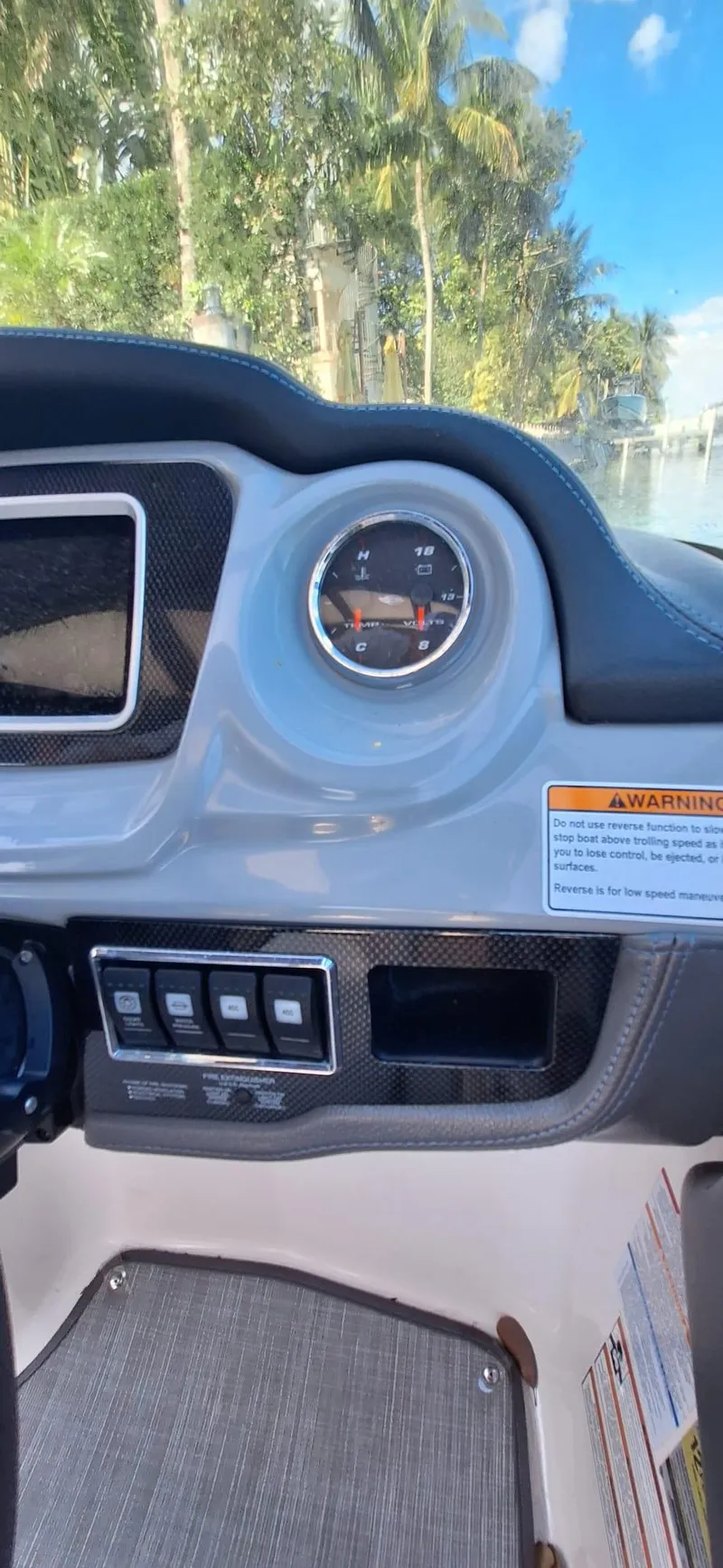 Slide: The Image of 2018 Chaparral Vortex 243 VRX dashboard with control panel and gauge. - 10