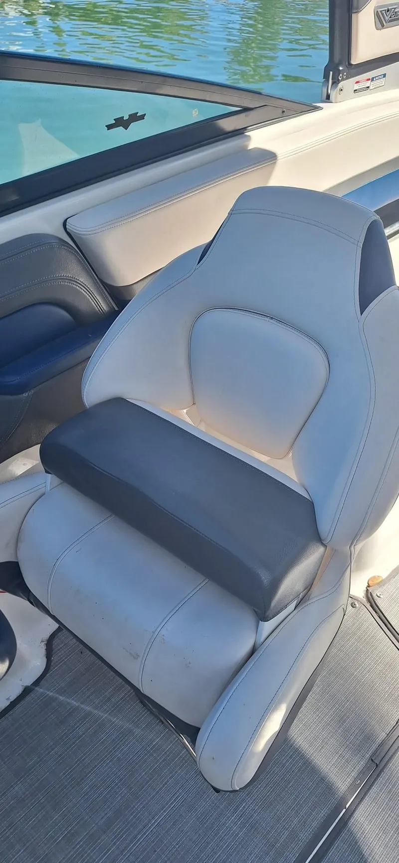 Slide: The Image of 2018 Chaparral Vortex 243 VRX boat seat, gray upholstery, on a sunny day. - 16