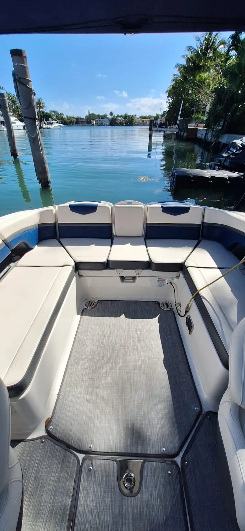 Slide: The Image of 2018 Chaparral Vortex 243 VRX boat interior with waterfront view. - 18