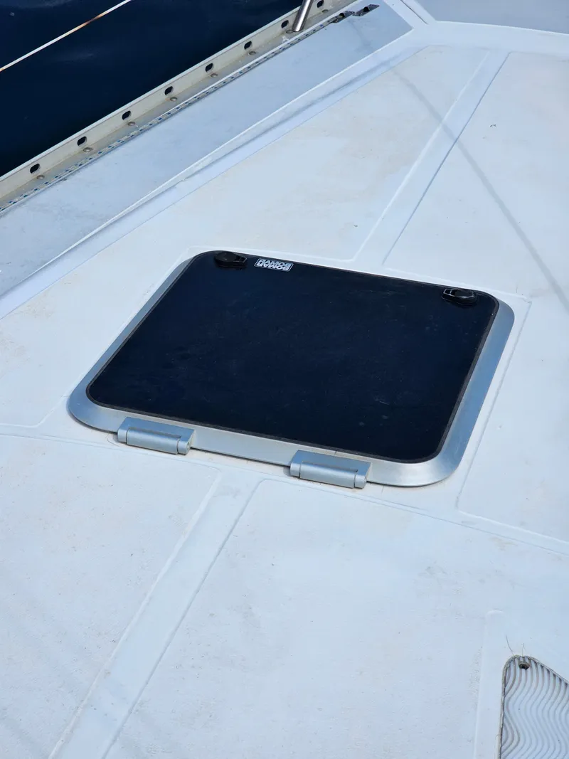 Slide: The Image of Deck hatch on a 1988 Hunter Legend 35 sailboat. - 13