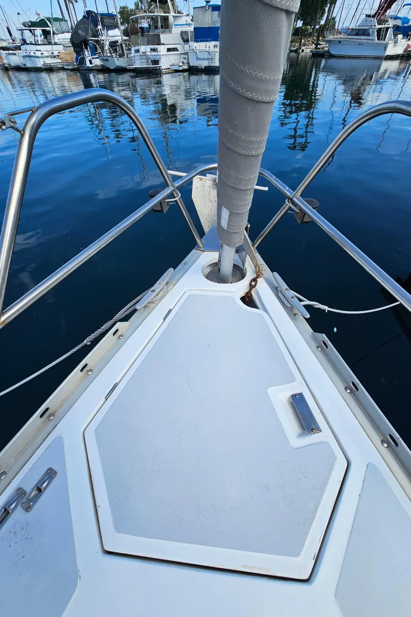 Slide: The Image of Bow of a 1988 Hunter Legend 35 sailboat in harbor. - 15