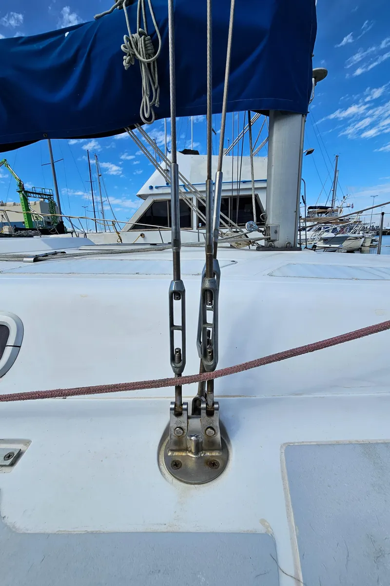 Slide: The Image of Close-up of 1988 Hunter Legend 35 sailboat rigging in marina. - 22