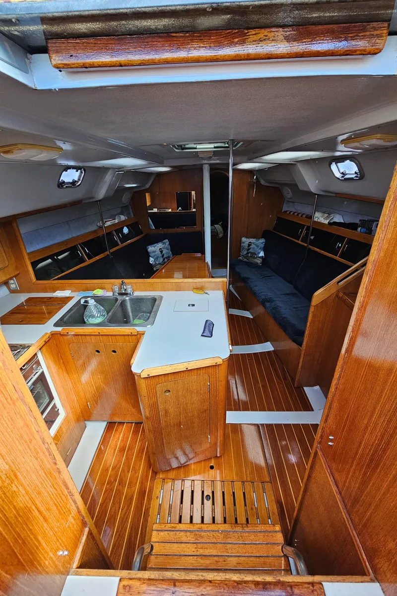 Slide: The Image of Interior of 1988 Hunter Legend 35 sailboat with wooden finishes. - 28