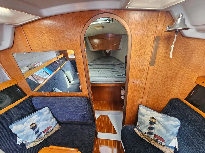 Slide: The Image of Interior of 1988 Hunter Legend 35 sailboat with cozy seating. - 34