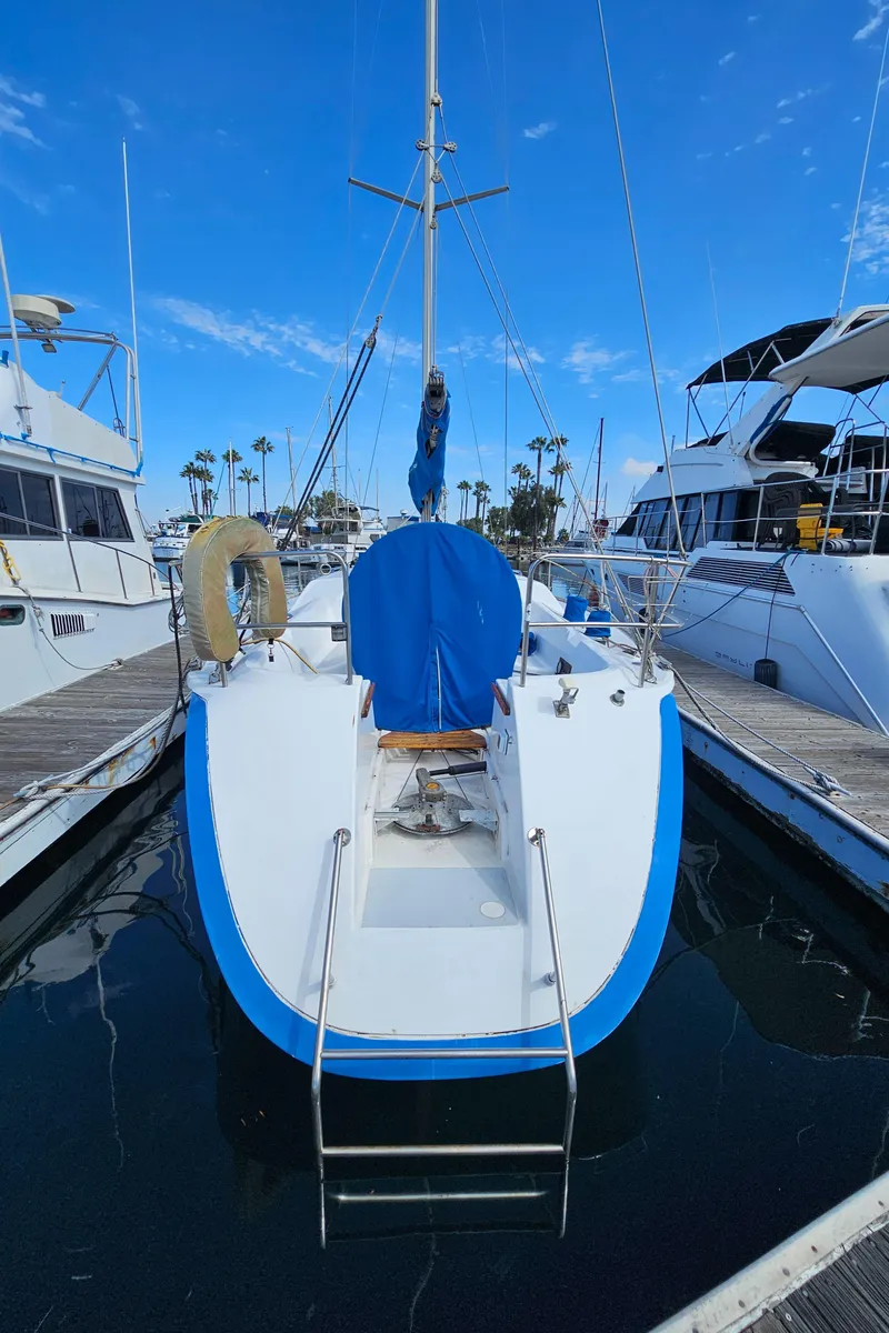 Slide: The Image of 1988 Hunter Legend 35 sailboat docked in marina. - 5