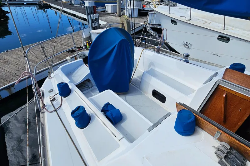 Slide: The Image of 1988 Hunter Legend 35 sailboat cockpit with blue covers. - 6
