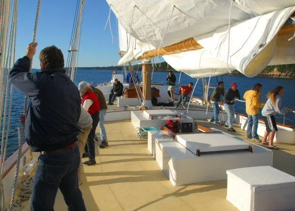 Slide: The Image of People working on the deck of a 2006 Schooner HARRIS and BISHOP sailboat. - 20