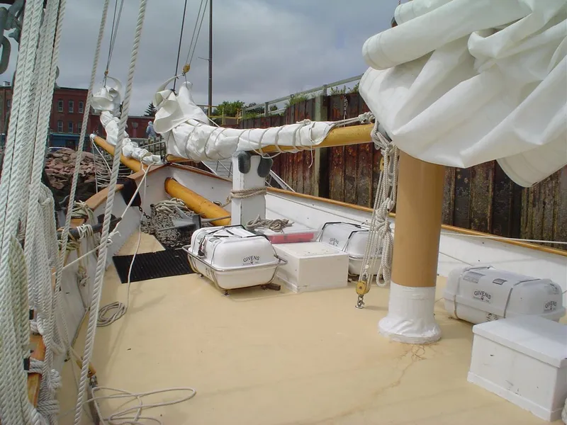 Slide: The Image of Schooner HARRIS and BISHOP 2006 deck with sails and equipment. - 21