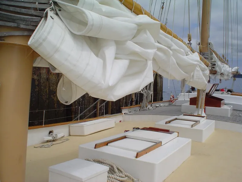 Slide: The Image of Schooner HARRIS and BISHOP 2006 deck with sails and rigging. - 26