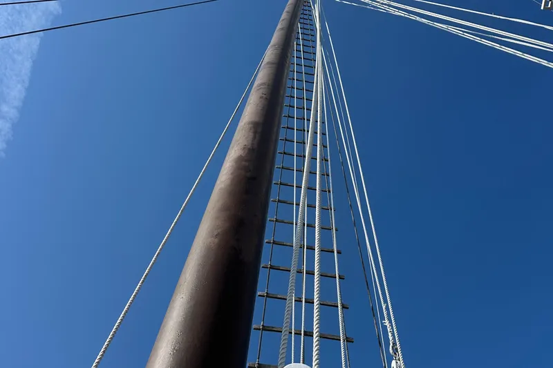 Slide: The Image of Tall ship mast with rigging against clear blue sky, Schooner HARRIS and BISHOP, 2006. - 32