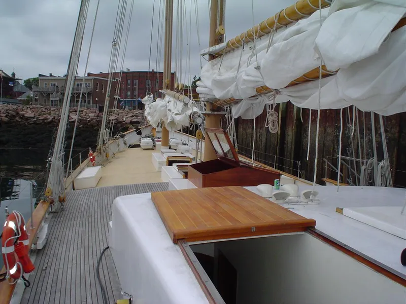 Slide: The Image of Schooner HARRIS and BISHOP 2006 docked, showcasing deck and rigging details. - 41