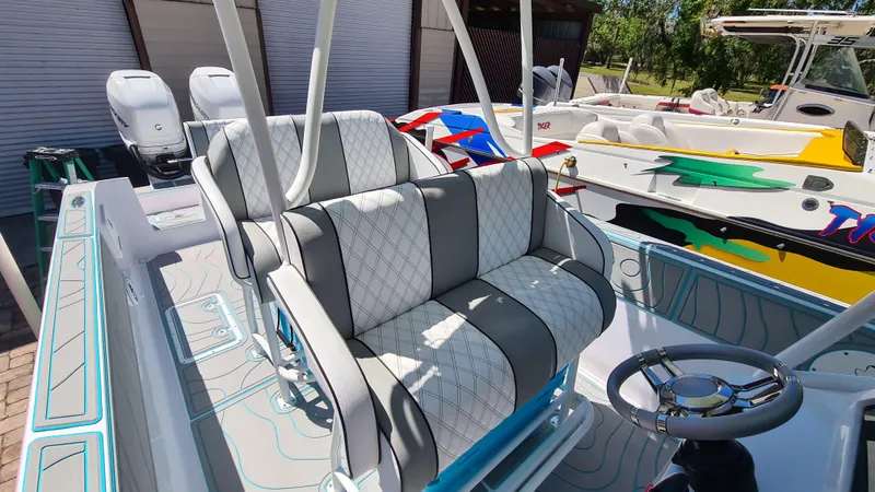 Slide: The Image of 2025 Custom Core 38 Center Console boat with stylish seating and modern design. - 19