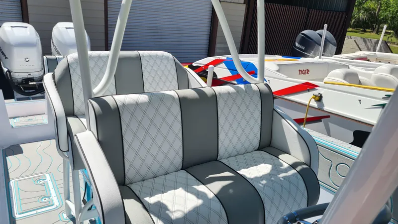 Slide: The Image of 2025 Custom Core 38 Center Console with luxurious seating and modern design. - 20