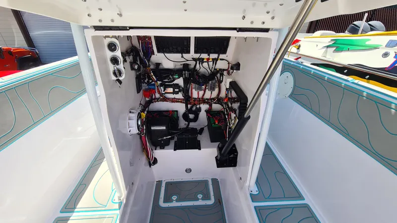 Slide: The Image of 2025 Custom Core 38 Center Console boat interior wiring and components. - 9
