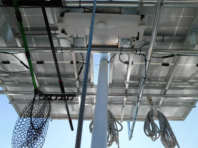 Slide: The Image of View of solar panels and rigging on a 1984 Tayana 37 sailboat. - 23