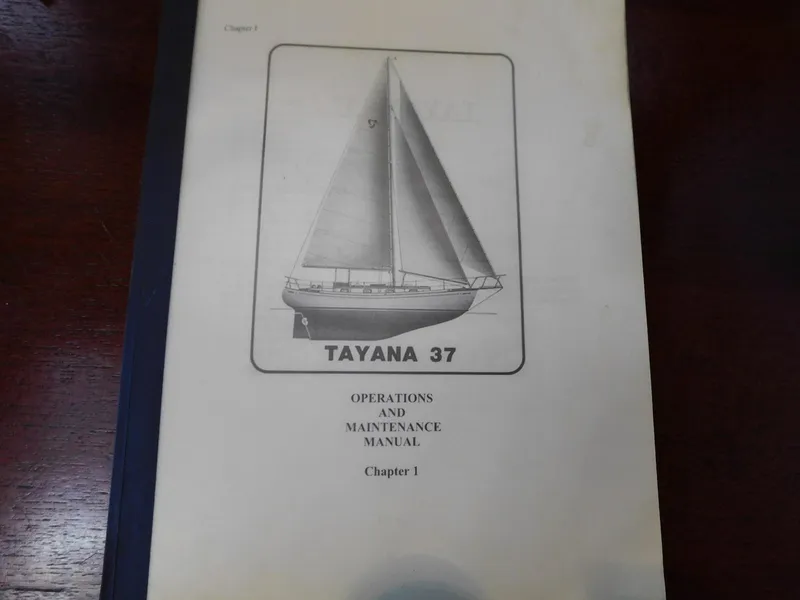 Slide: The Image of Operations manual cover for 1984 Tayana 37 sailboat, featuring a detailed illustration. - 26