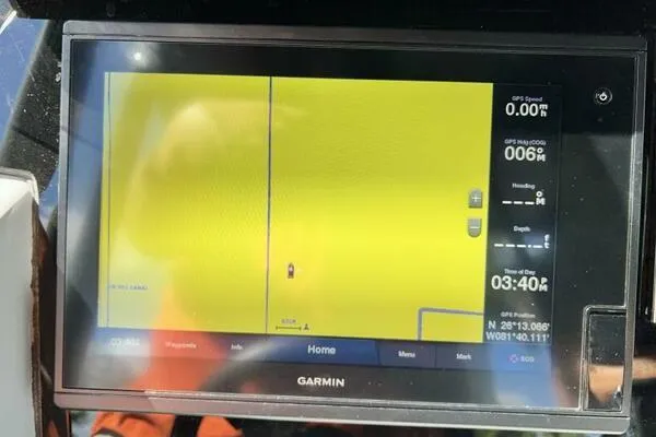 Slide: The Image of Garmin GPS display on 1996 Formula 382 SR1 boat, showing navigation details. - 23