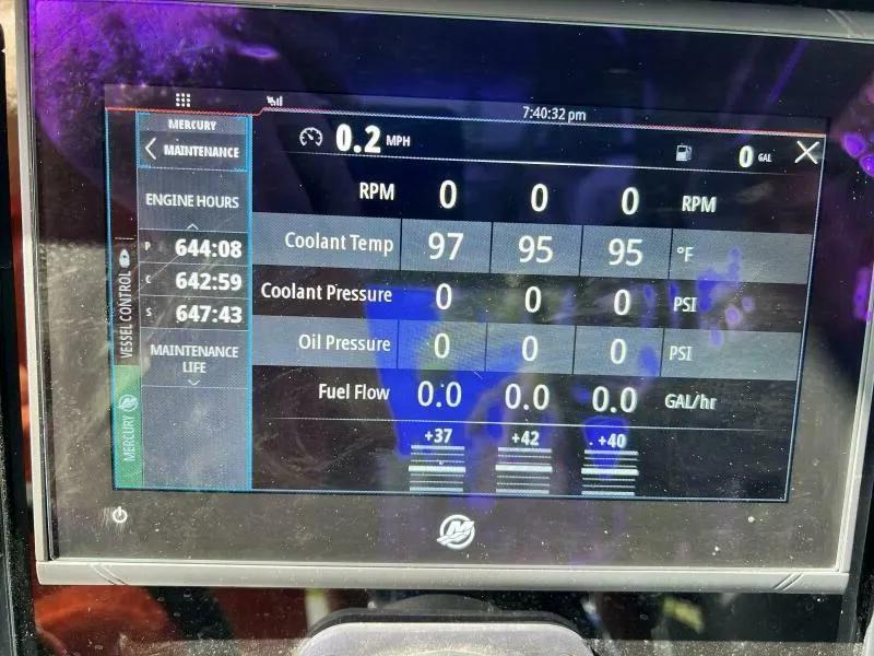 Slide: The Image of Dashboard of a 1996 Formula 382 SR1 showing engine metrics and maintenance data. - 25