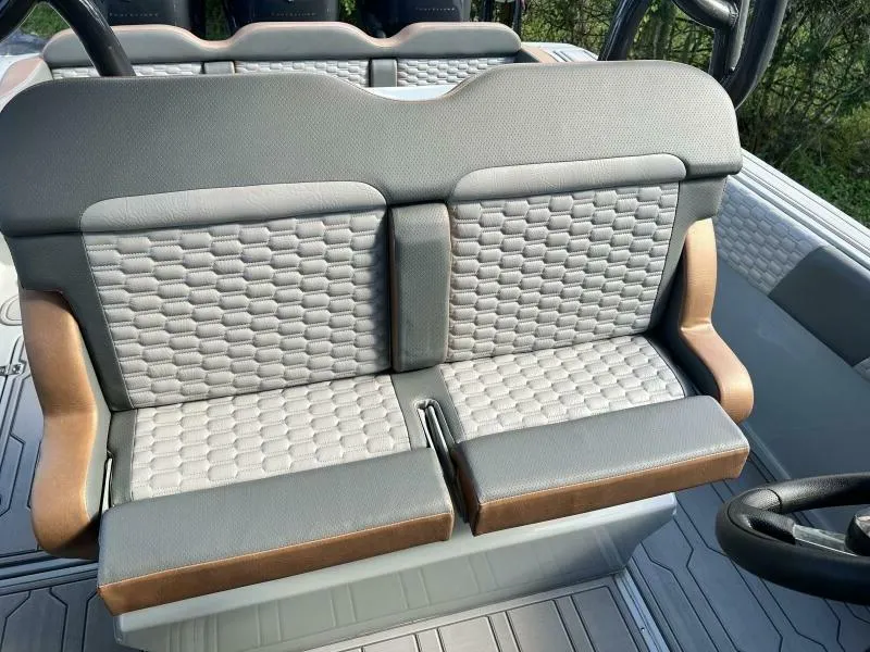Slide: The Image of 1996 Formula 382 SR1 boat seats with textured gray upholstery and brown accents. - 30