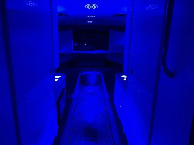 Slide: The Image of Interior of a 1996 Formula 382 SR1 boat with blue ambient lighting. - 33