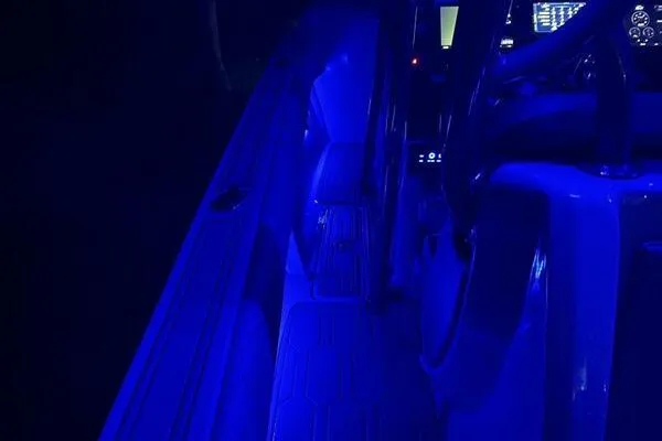 Slide: The Image of 1996 Formula 382 SR1 boat interior illuminated with blue LED lights. - 35