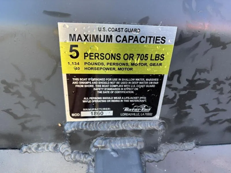 Slide: The Image of 2025 Gator Tail 18/60 Extreme Series capacity label: 5 persons or 705 lbs. - 14