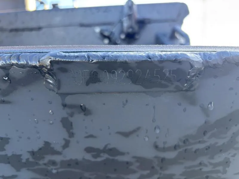 Slide: The Image of Close-up of Gator Tail 18/60 Extreme Series 2025 boat hull with serial number. - 16