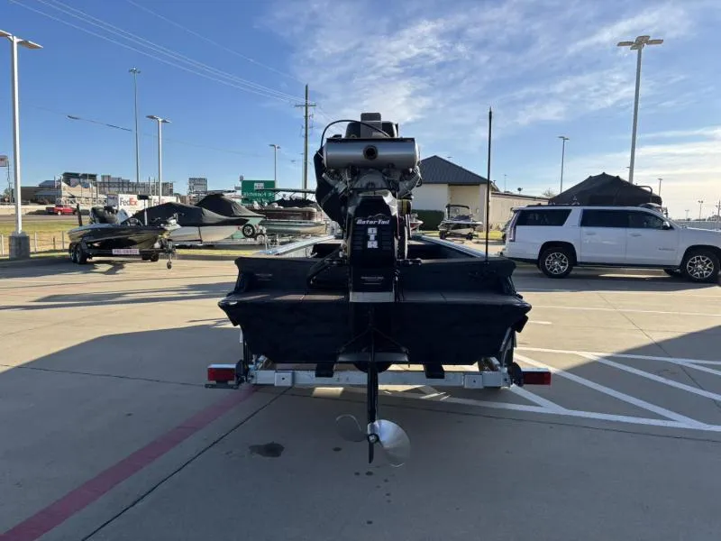Slide: The Image of 2025 Gator Tail 18/60 Extreme Series boat on trailer in parking lot. - 6
