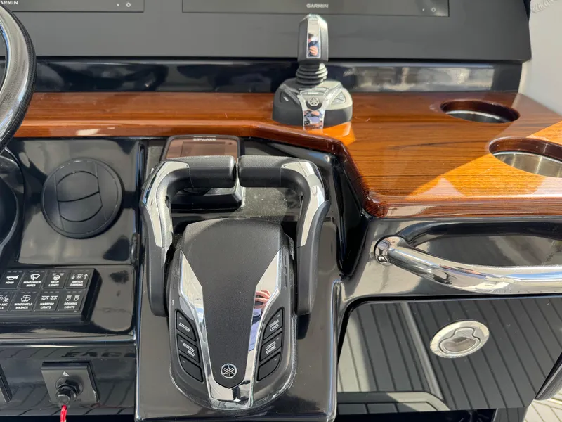 Slide: The Image of Control panel of 2022 Everglades 395cc boat with Yamaha throttle and joystick. - 11