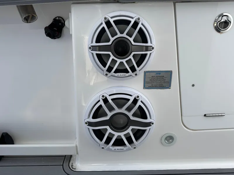 Slide: The Image of 2022 Everglades 395cc boat with dual marine speakers and control panel. - 17