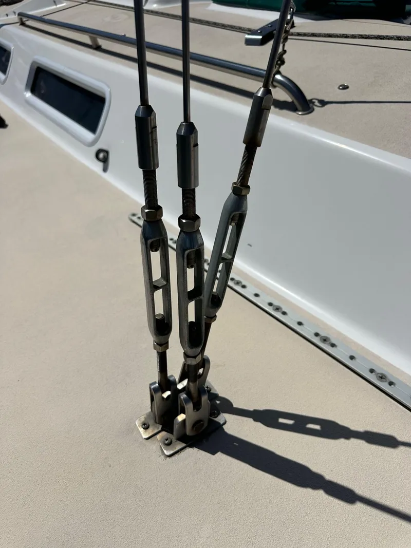 Slide: The Image of Close-up of rigging hardware on a 1996 J Boats J/120 sailboat deck. - 21
