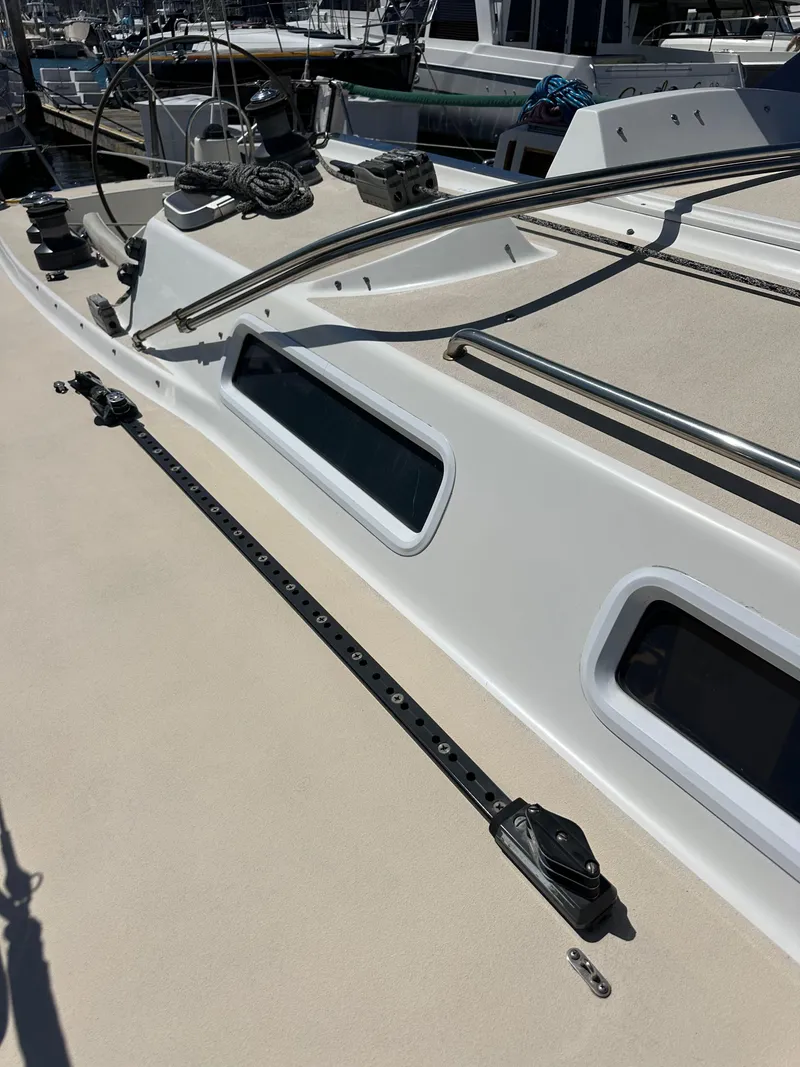 Slide: The Image of 1996 J Boats J/120 deck with sleek design and modern fittings. - 22