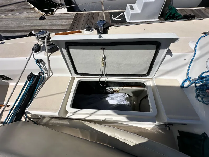 Slide: The Image of Open storage compartment on 1996 J Boats J/120 sailboat deck. - 32