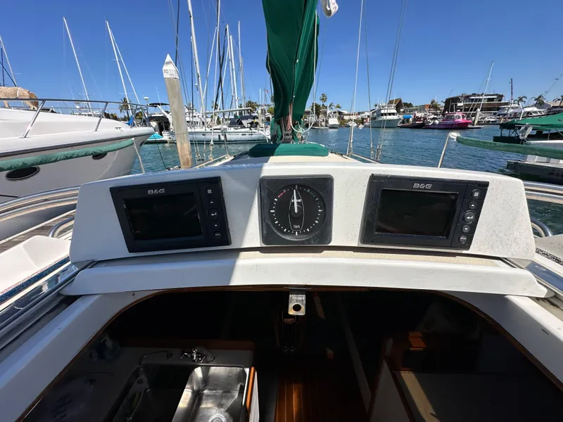 Slide: The Image of Cockpit view of a 1996 J Boats J/120 sailboat with navigation instruments. - 35