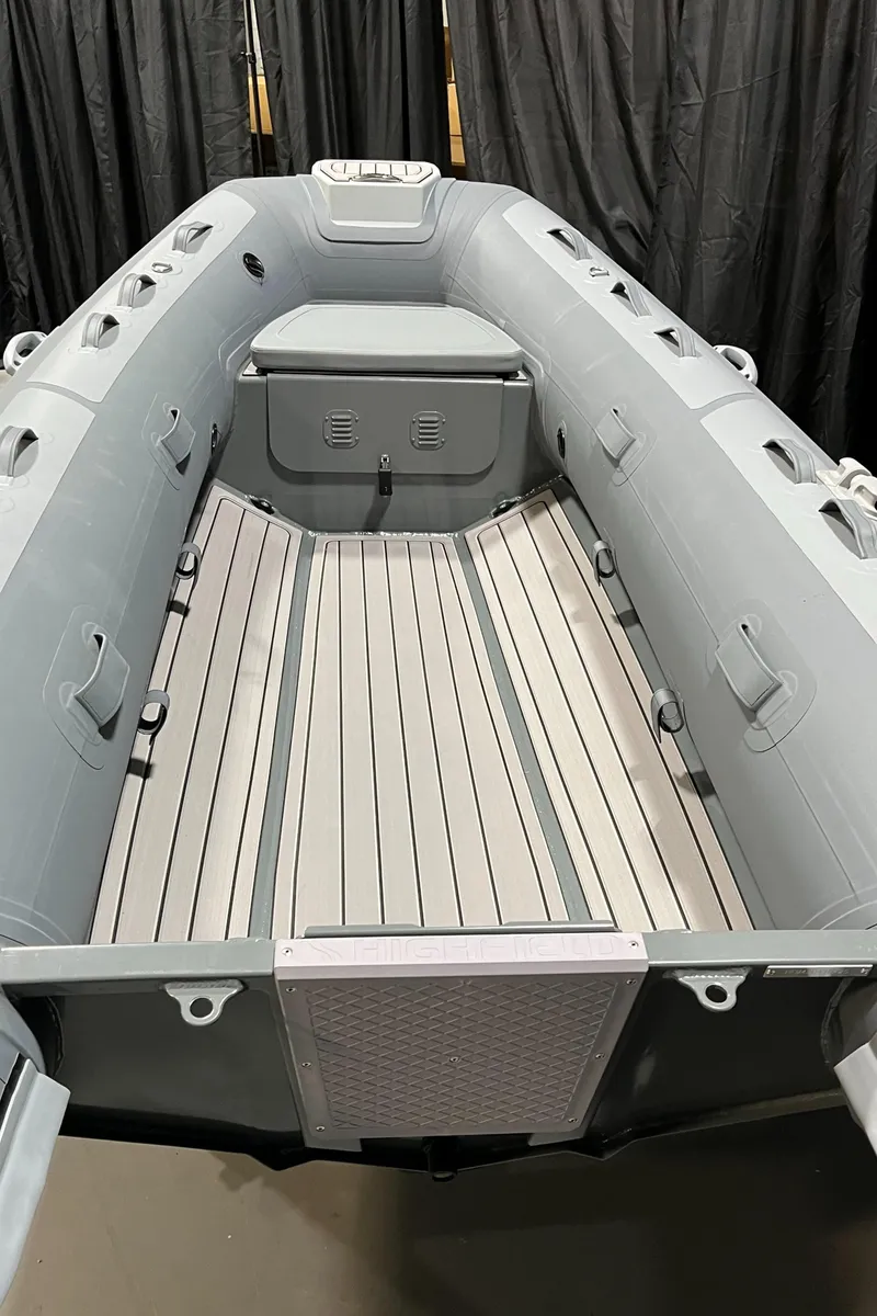 Slide: The Image of 2025 Highfield Classic 340 inflatable boat with sleek gray interior and durable construction. - 4