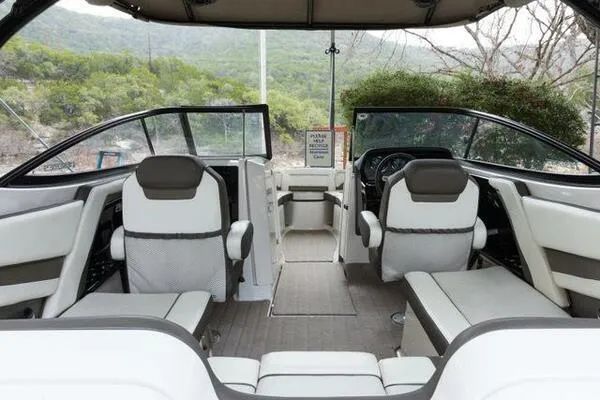 Slide: The Image of Interior of a 2016 Yamaha Boats 242 Limited S E-Series, featuring spacious seating and modern design. - 15