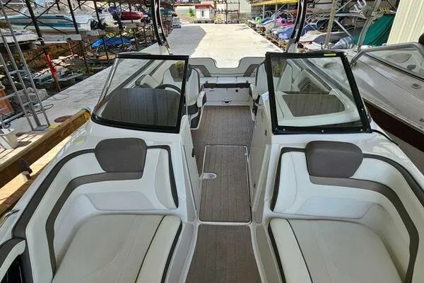 Slide: The Image of 2016 Yamaha Boats 242 Limited S E-Series interior with spacious seating and sleek design. - 47