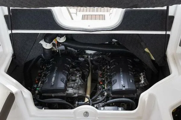 Slide: The Image of Engine compartment of a 2016 Yamaha Boats 242 Limited S E-Series, showcasing dual high-output engines. - 8
