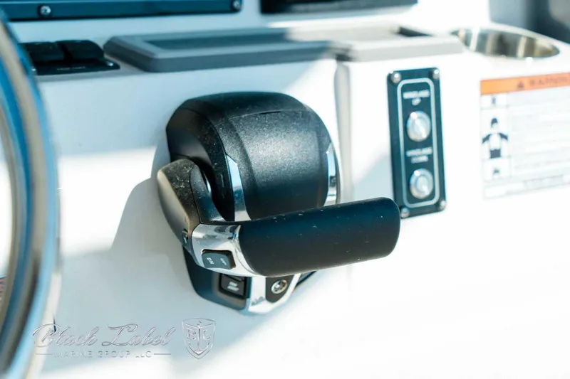 Slide: The Image of Throttle control on 2025 Sea Fox 248 Commander boat dashboard. - 18