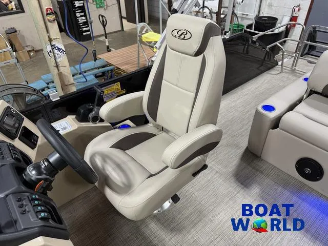 Slide: The Image of 2025 Bentley Pontoons Legacy 223 Tritoon captain's chair with steering console, showcased at Boat World. - 12