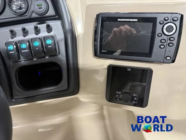 Slide: The Image of Control panel of 2025 Bentley Pontoons Legacy 223 with Humminbird and JBL systems. - 16
